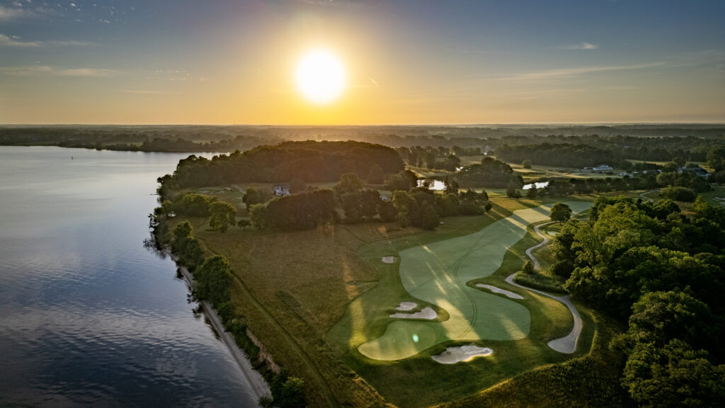 aerial view of queenstown harbor's golf courses