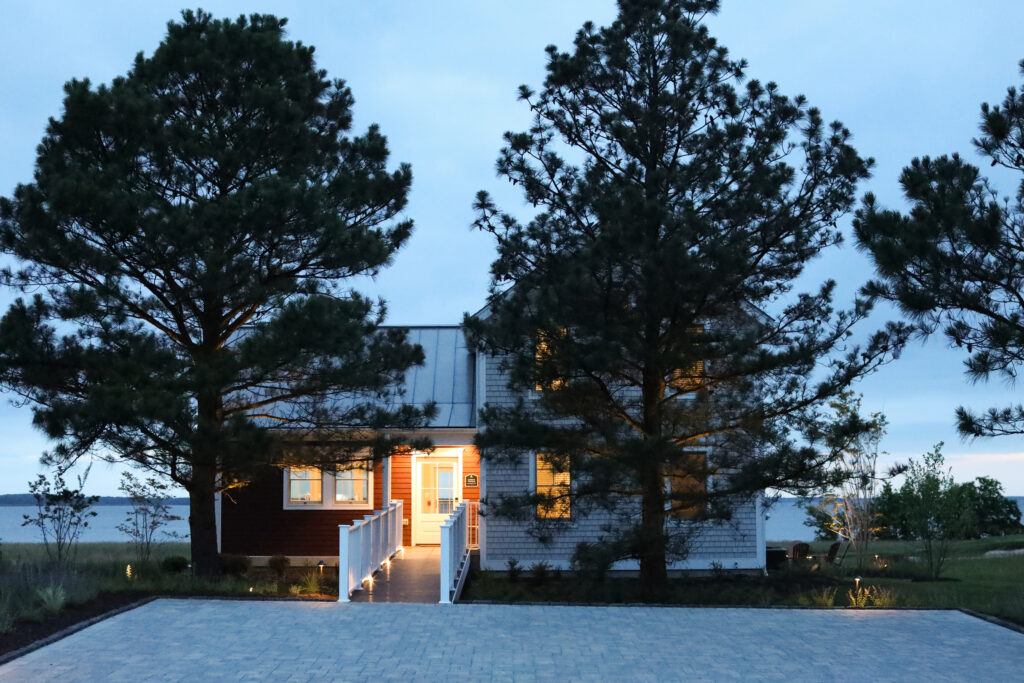 queenstown harbor golf resort cottages glow in the winter evening