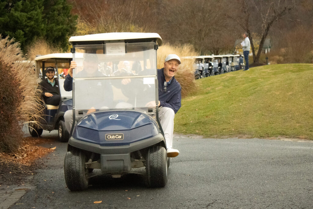 a man is happy to have golfed at queenstown harbor golf resort for a thanksgiving tradition